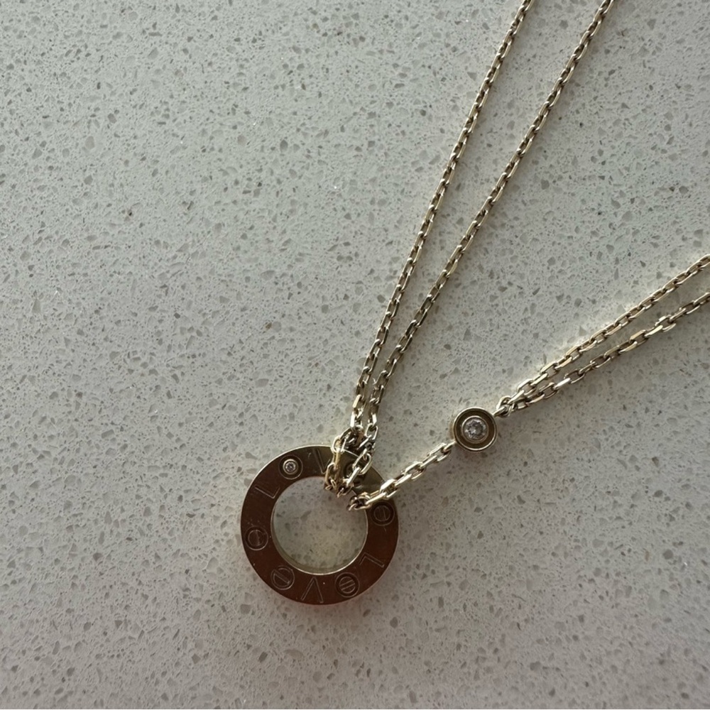 Elegant Gold Cartier Necklace with diamond Pendant